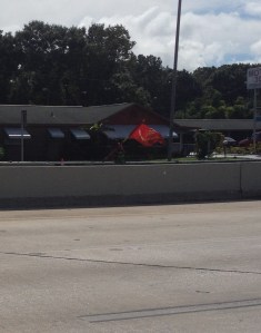 This runner was wearing a gas mask, carrying a USMC flag and a rucksack on his back.